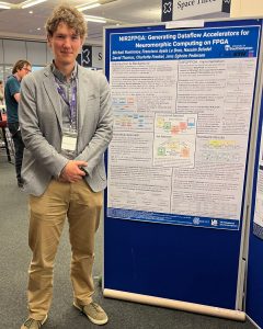 Michael Rontionov, MINDS CDT, presenting NIR2FPGA at NEXT-AI 2026
